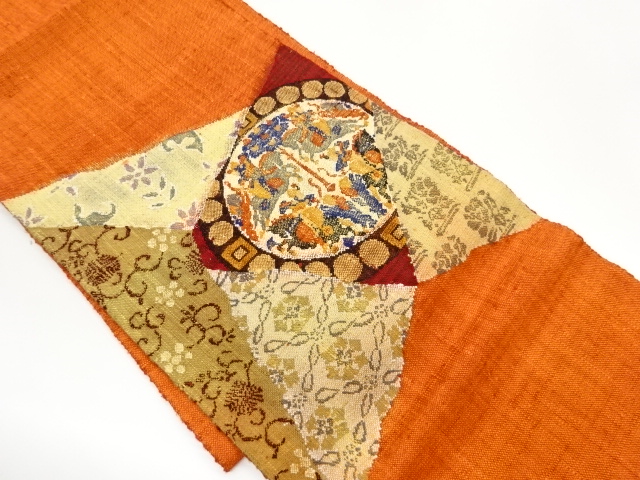 手織り真綿紬切り嵌め風花唐草・連珠狩猟文織出し名古屋帯